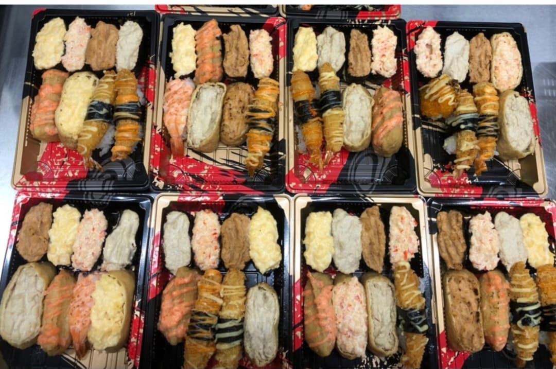2 boxes of sushi raja uda